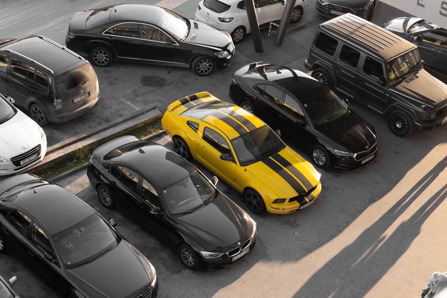 Large rental car fleet parked in a lot representing asset-backed securitization collateral