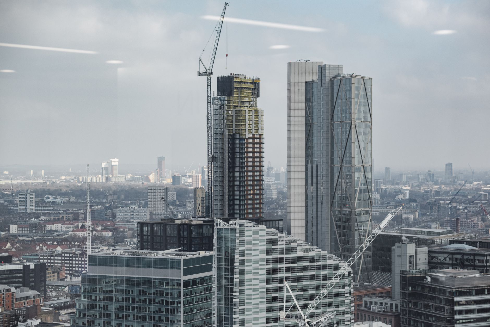 Financial analysts reviewing infrastructure investment documents in a modern office setting