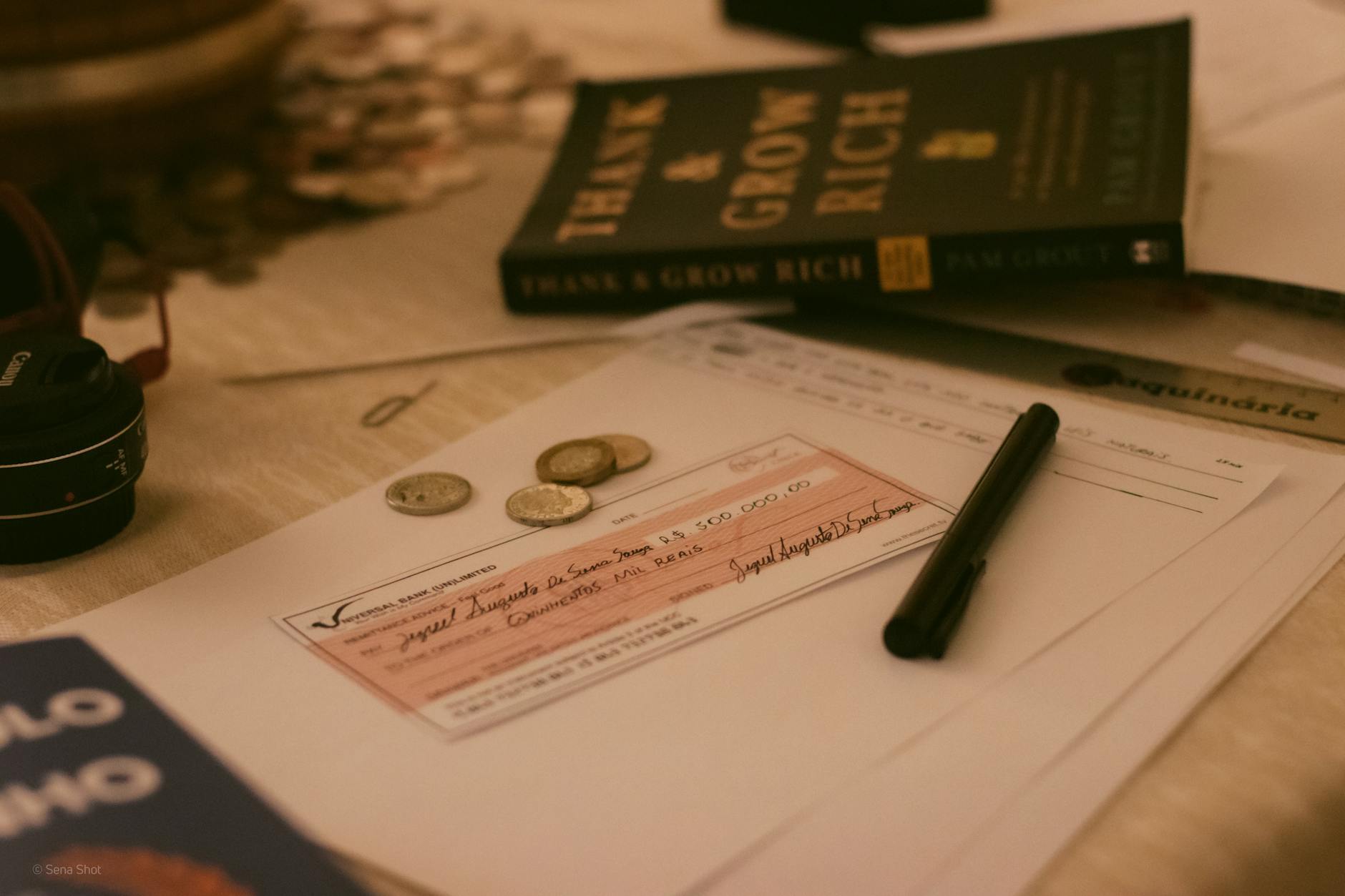 Two professionals reviewing financial documents at a private meeting