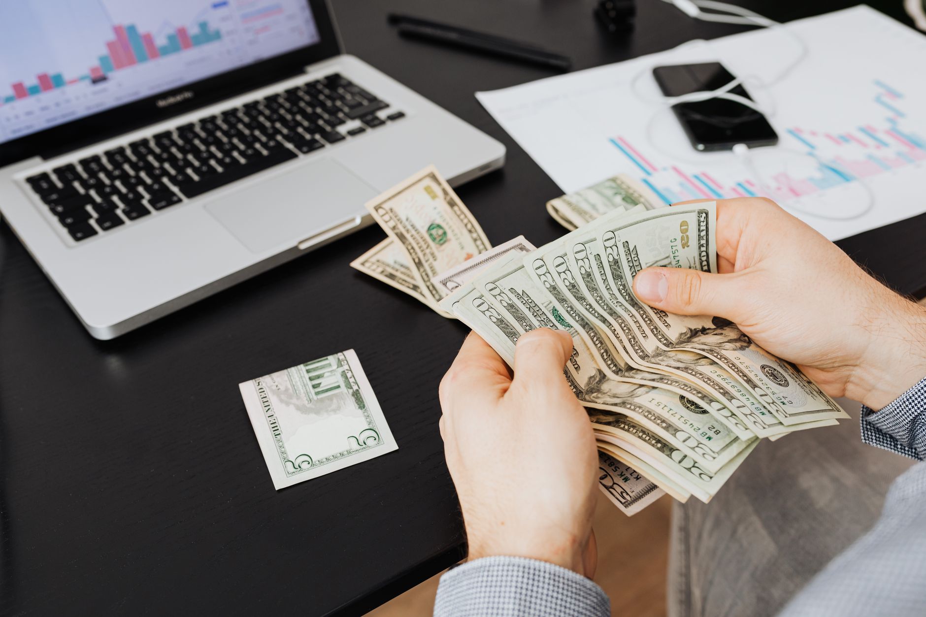 Portfolio manager analyzing closed-end fund holdings and credit quality reports