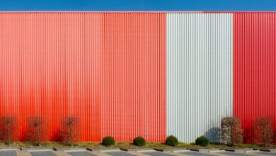 Exterior view of a large data center facility with power infrastructure