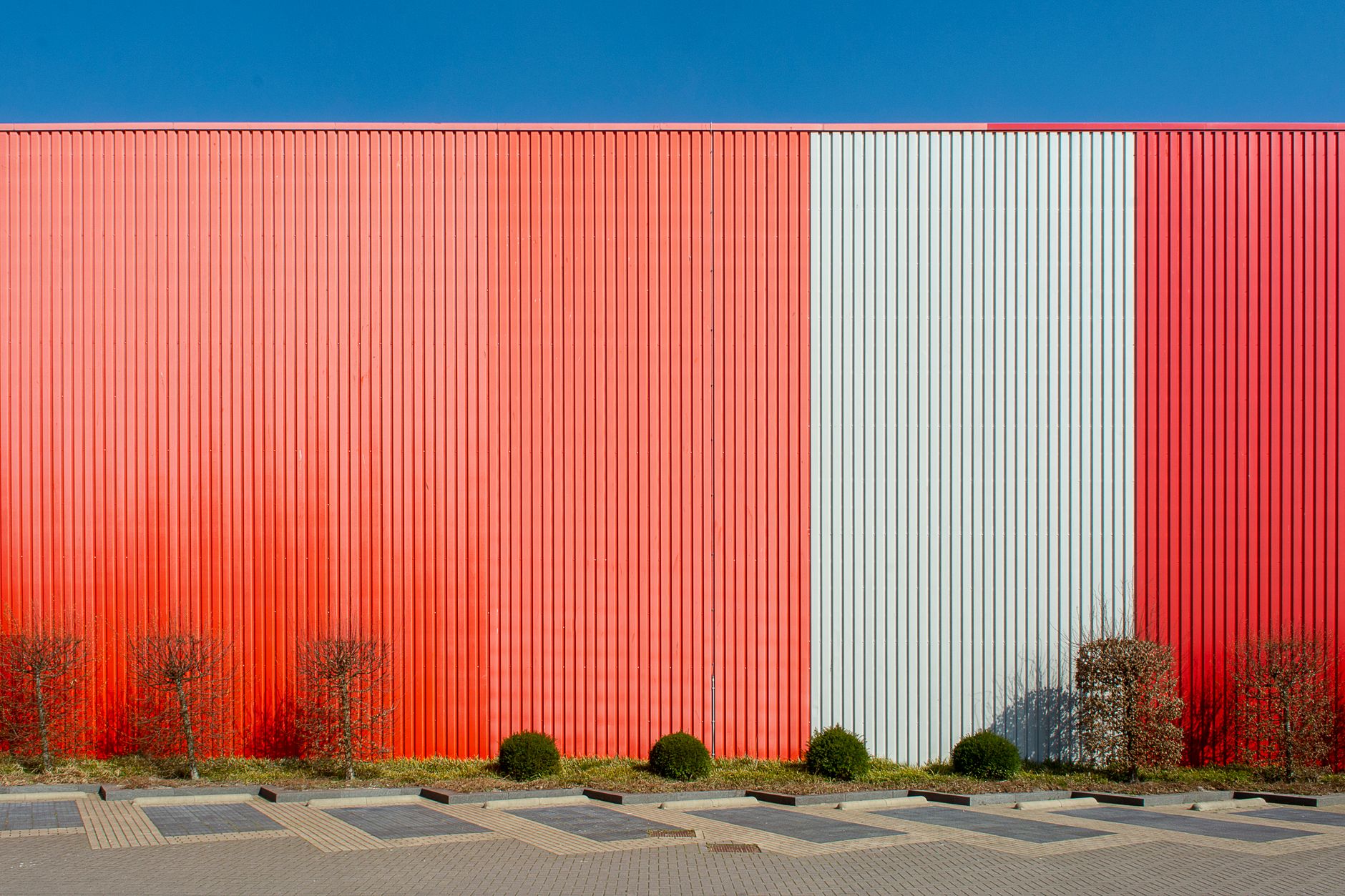 Exterior view of a large data center facility with power infrastructure