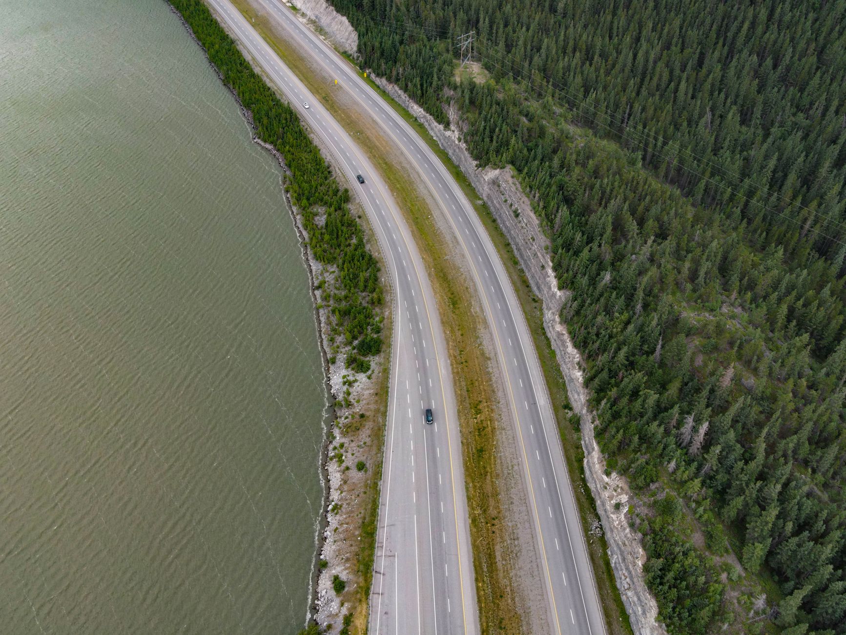 Aerial view of a multi-lane toll highway stretching through open landscape