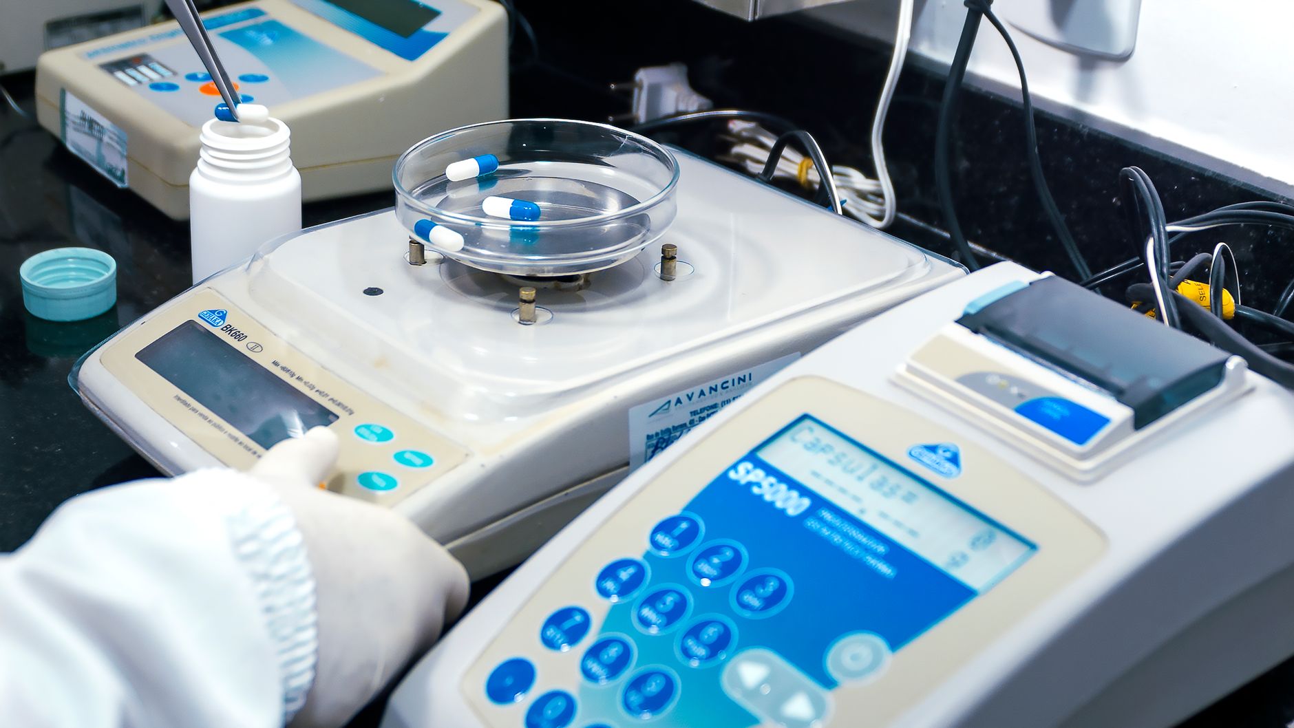 Scientist working in a pharmaceutical research laboratory examining drug compounds