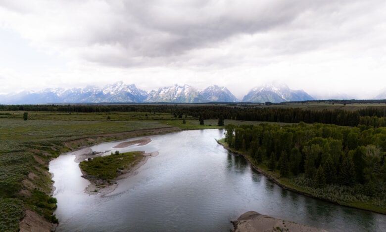 Wide river flowing through arid western landscape representing water rights and scarcity