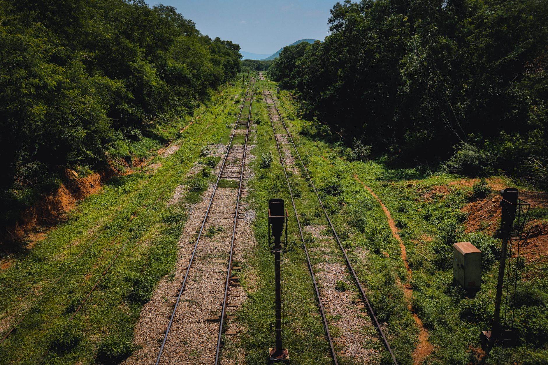Aerial view of railroad tracks stretching across open countryside
