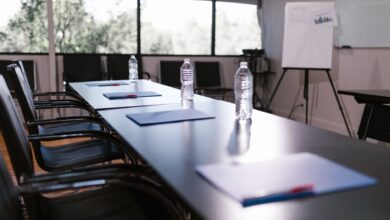 Business professionals meeting in a boardroom to discuss private investment strategy