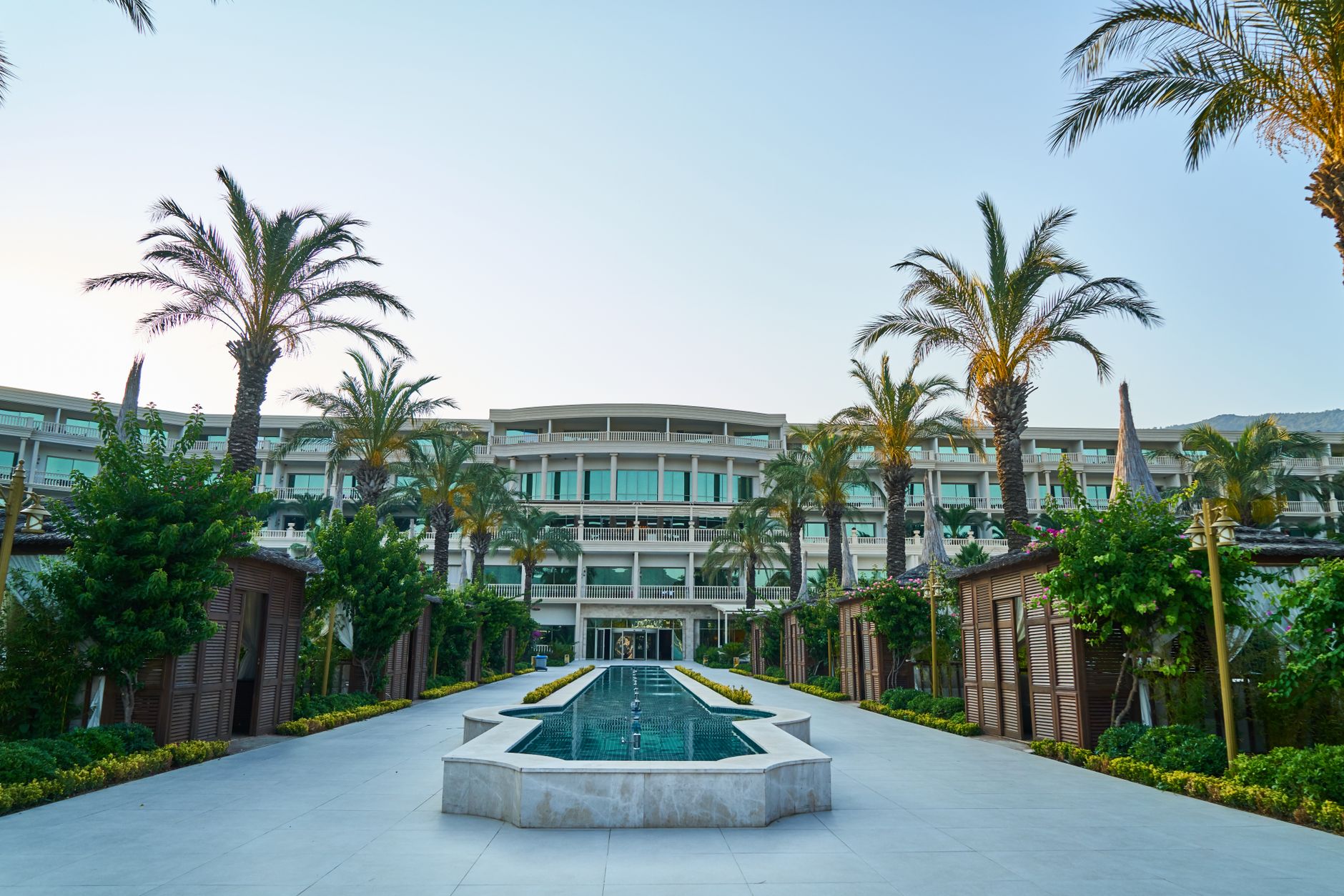 Exterior view of a large hotel building representing hotel real estate investment structures
