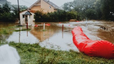 Urban stormwater drainage infrastructure with water flowing through city pipes