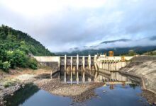 Large hydroelectric dam generating power from a river