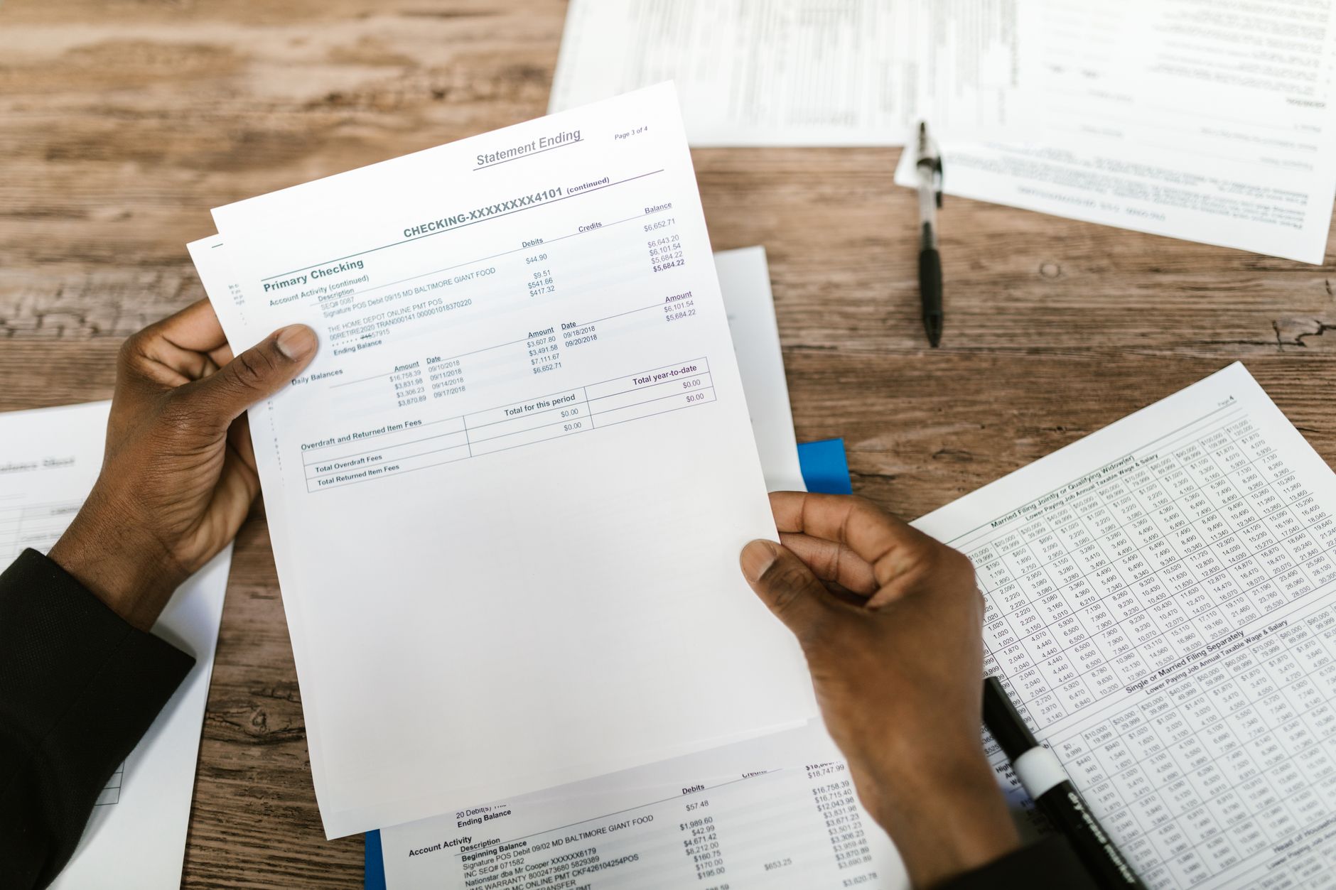 Financial contracts and documents on a desk, representing structured pipeline capacity rights agreements