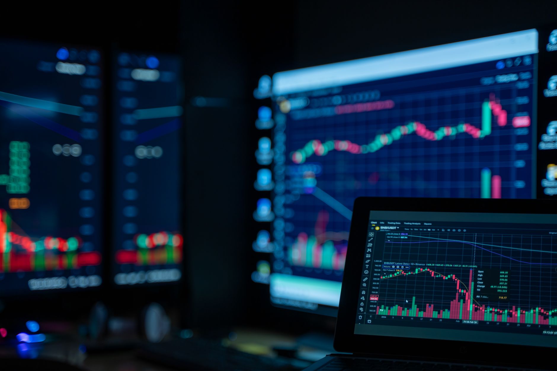 Financial traders reviewing fixed income bond market data on screens