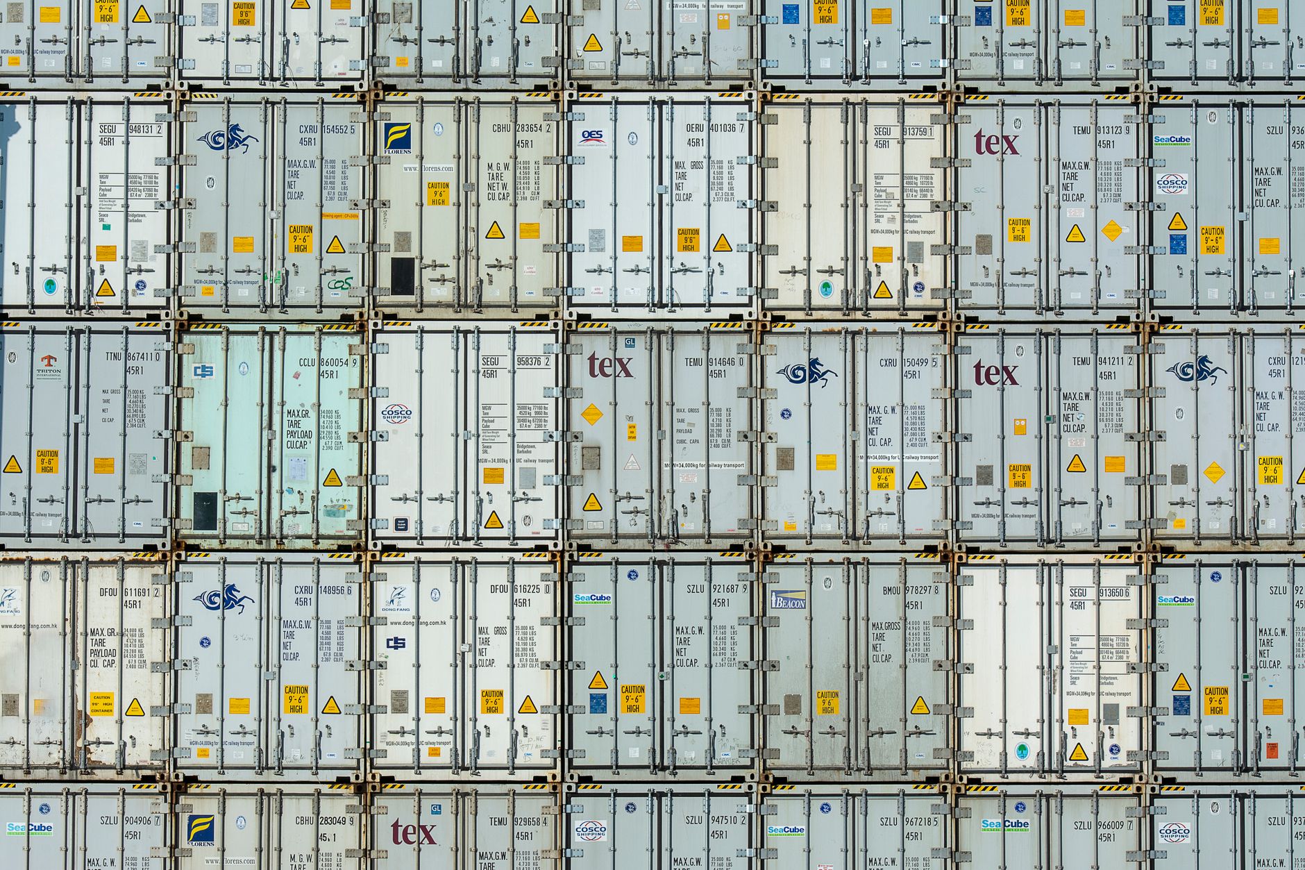 Aerial view of intermodal container freight yard with stacked containers