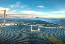 Aerial view of a large solar farm on open land