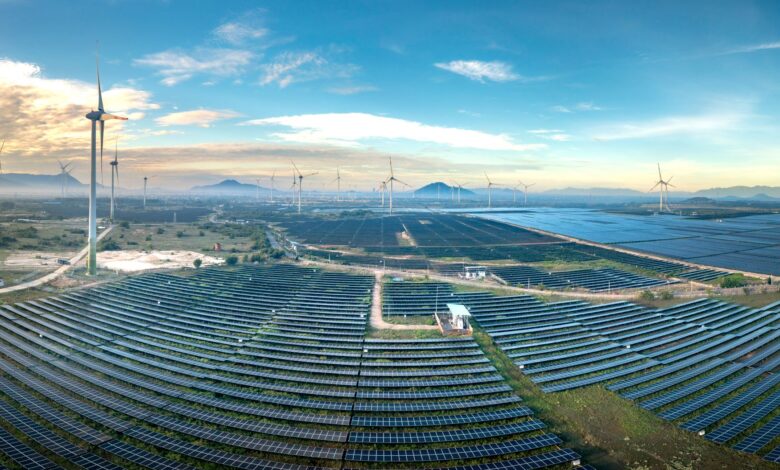 Aerial view of a large solar farm on open land