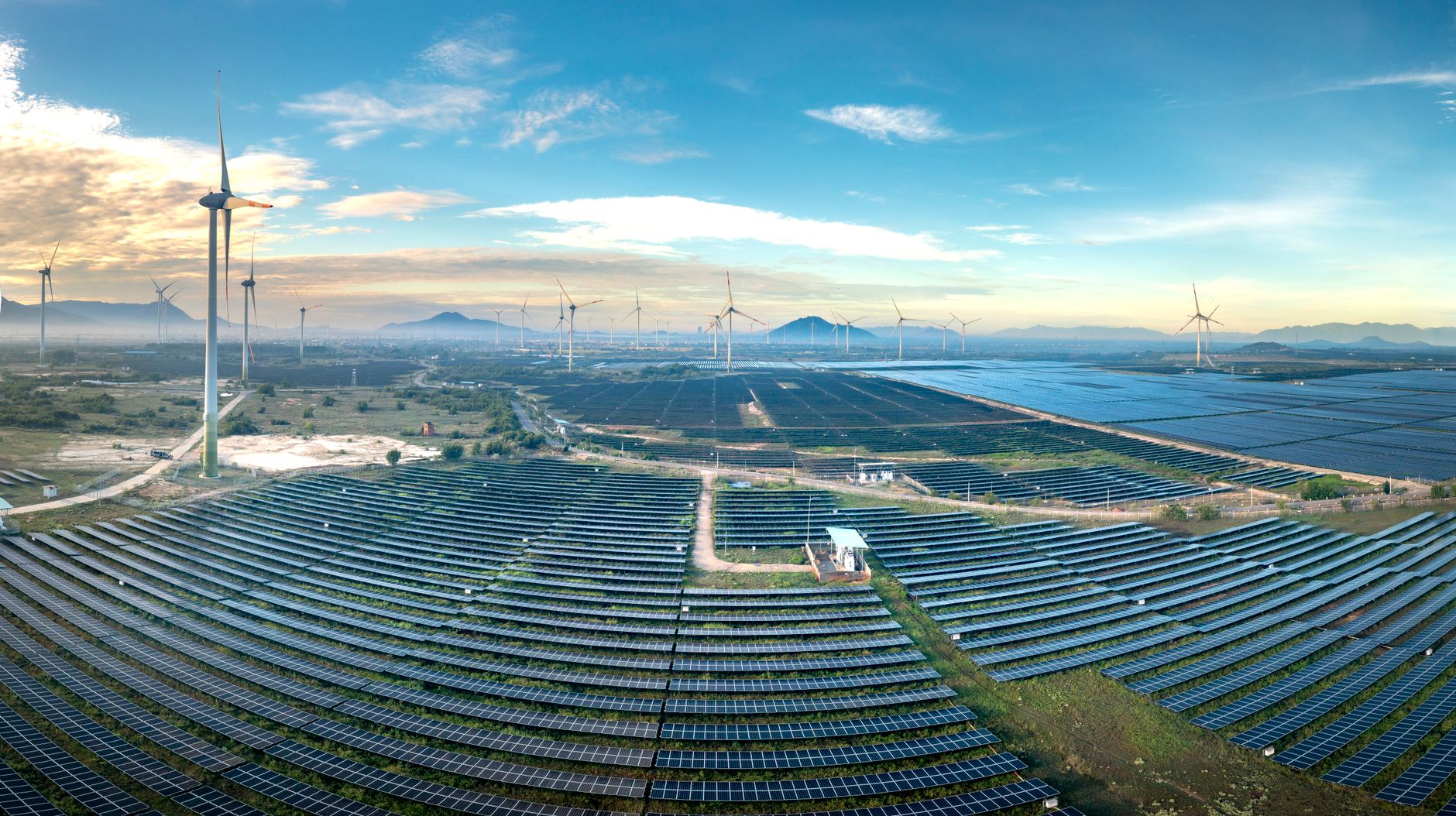 Aerial view of a large solar farm on open land