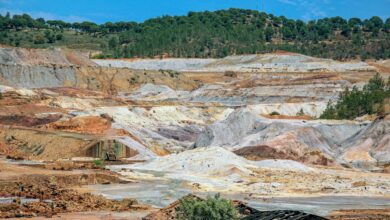 Open pit copper mine showing large scale excavation operations