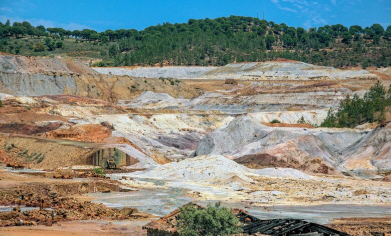 Open pit copper mine showing large scale excavation operations