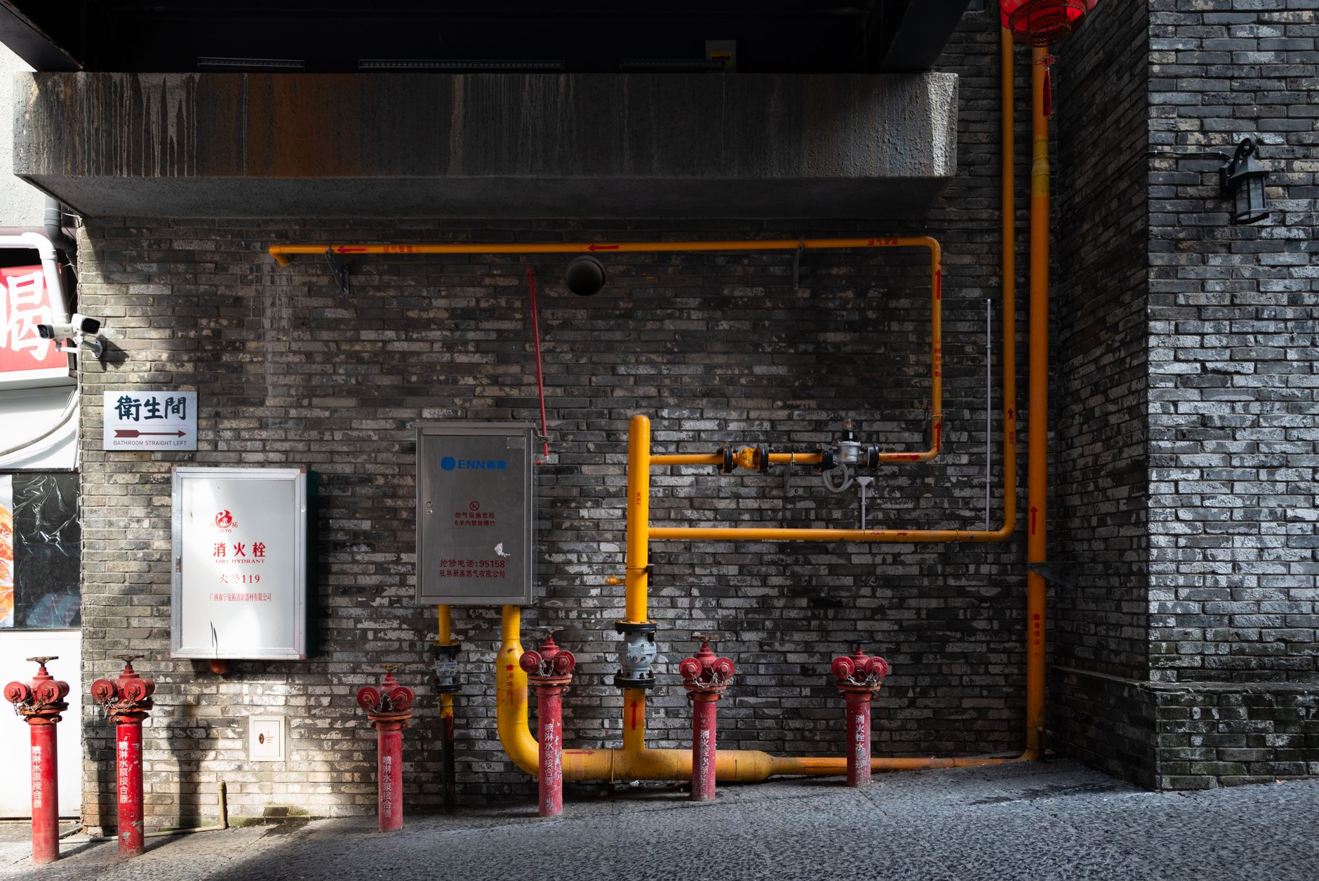 Industrial gas pipeline infrastructure in a rural landscape representing methane capture operations