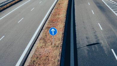 Aerial view of a major highway with multiple lanes of traffic