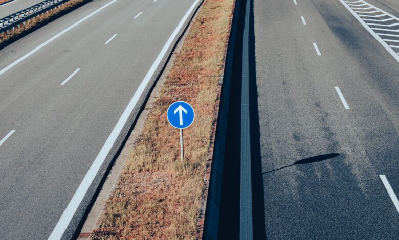 Aerial view of a major highway with multiple lanes of traffic