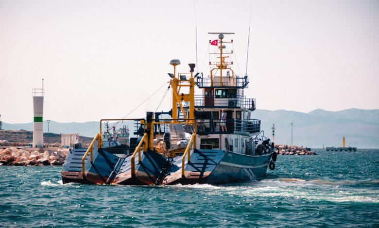 Large dredging vessel operating on the open ocean extracting seabed materials