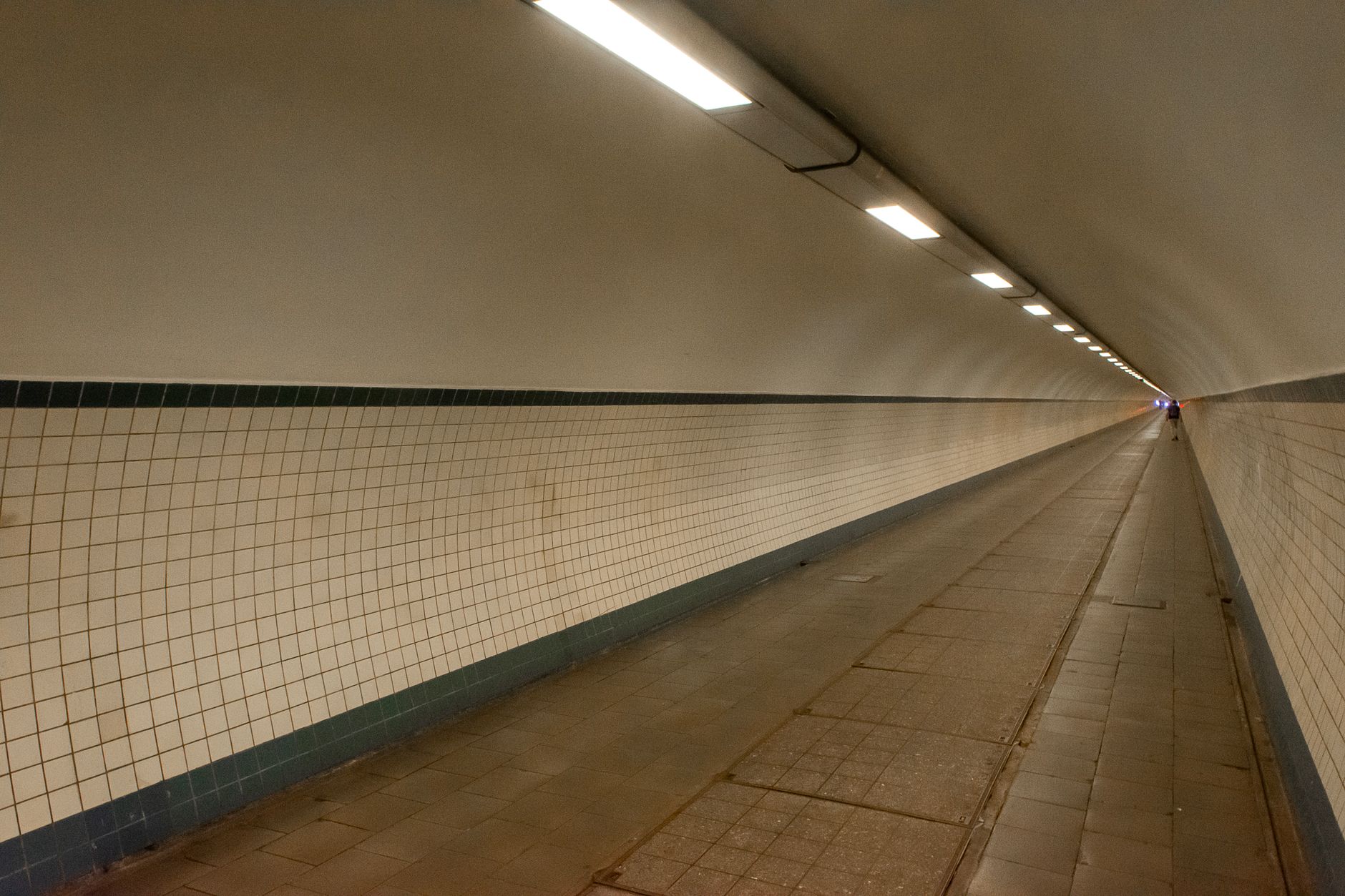 Underground utility corridor showing infrastructure conduit pathways beneath city streets