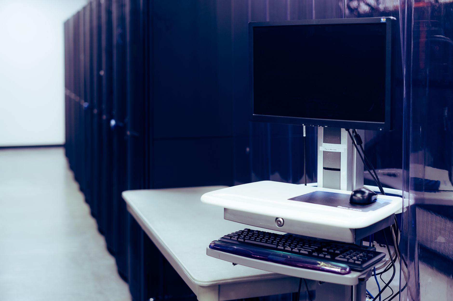 Interior of a data center with rows of servers representing digital infrastructure investment
