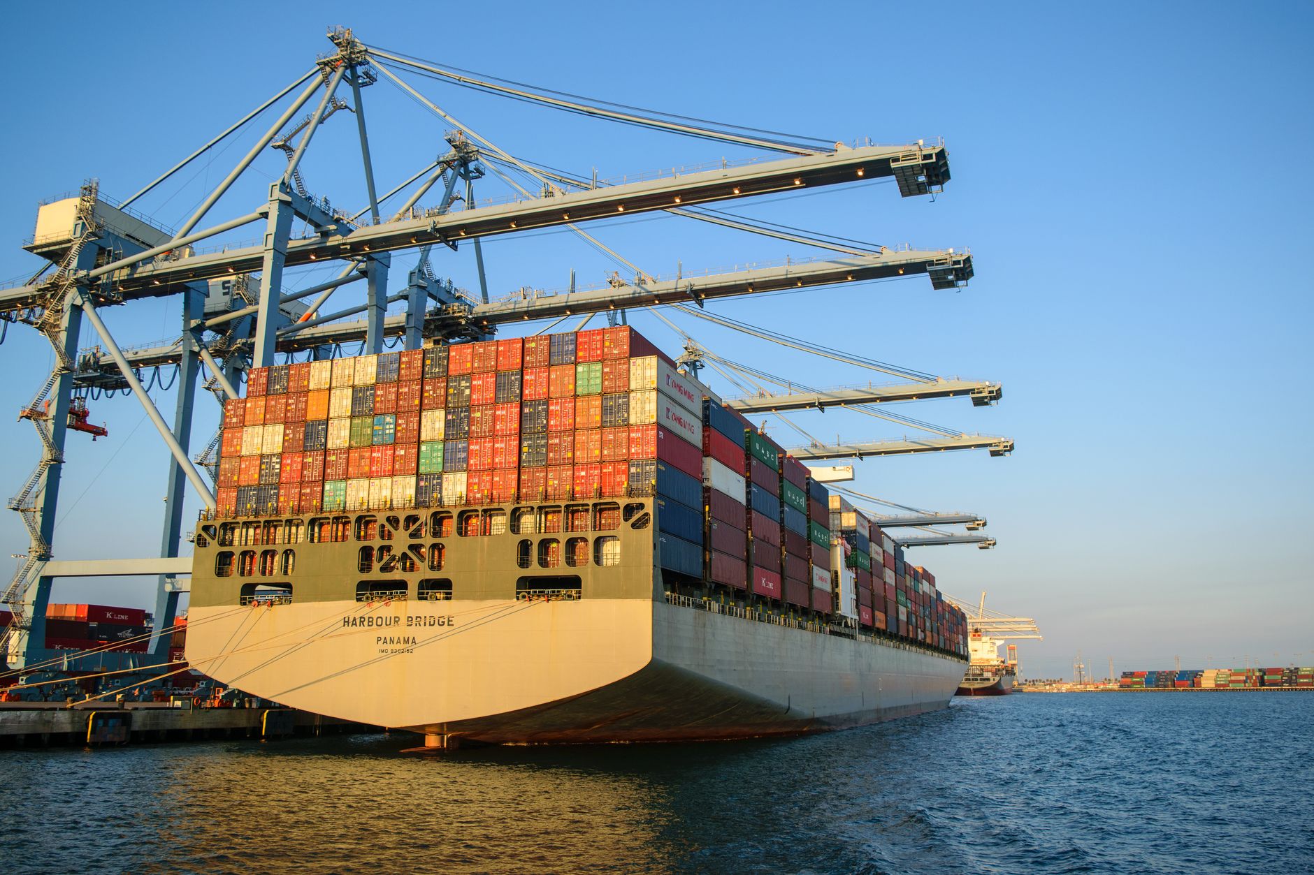 Container ships navigating a busy international shipping corridor