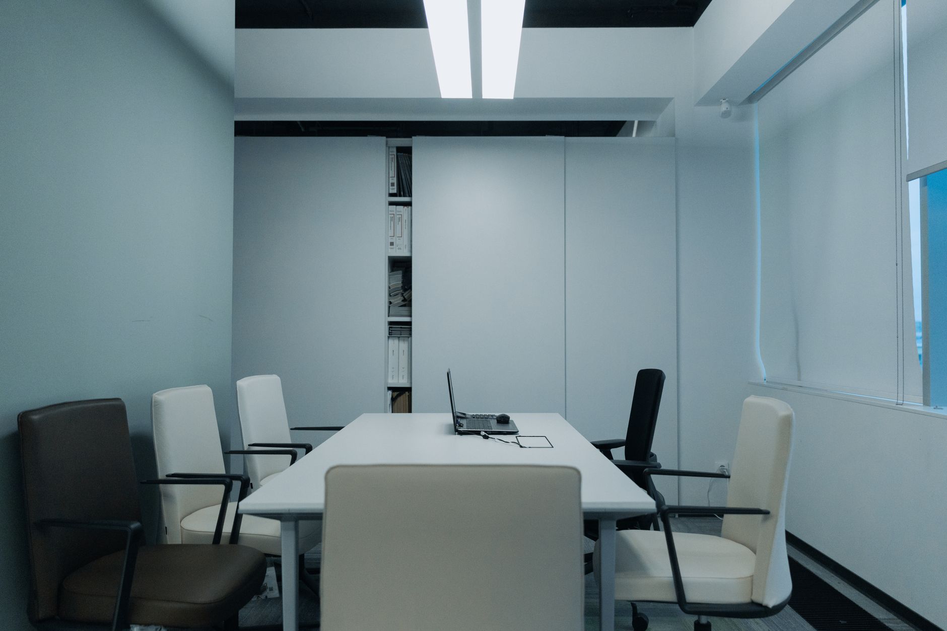 Family office conference room with documents and investment planning materials