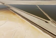 Aerial view of a vast salt flat landscape where lithium brine deposits are found