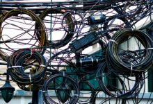 Coiled copper wire in an industrial facility representing refined copper supply chains