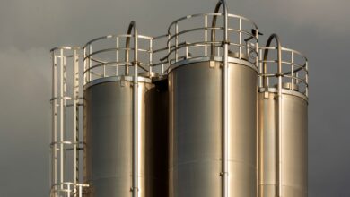 Large industrial liquid storage tanks at a distribution terminal facility