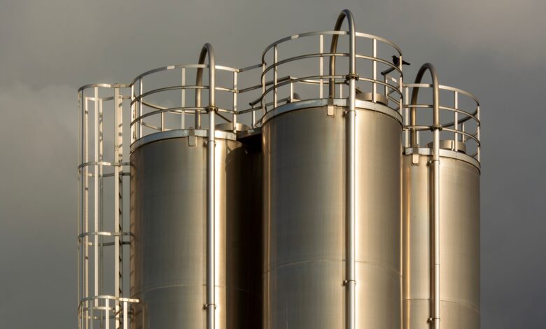 Large industrial liquid storage tanks at a distribution terminal facility