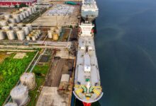 Large crude oil storage tanks at a coastal marine terminal facility
