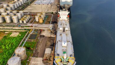 Large crude oil storage tanks at a coastal marine terminal facility