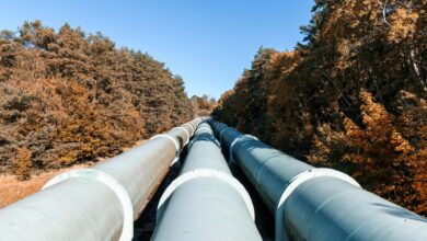 Aerial view of a freight pipeline corridor running across open land