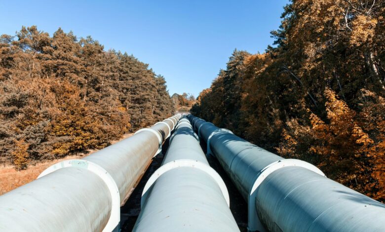 Aerial view of a freight pipeline corridor running across open land