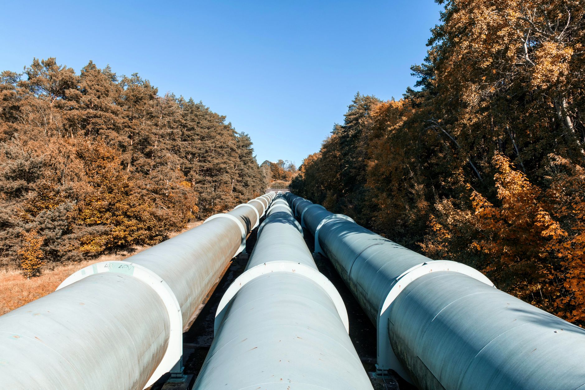 Aerial view of a freight pipeline corridor running across open land