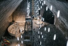 Interior of a large underground salt cavern showing geological formations