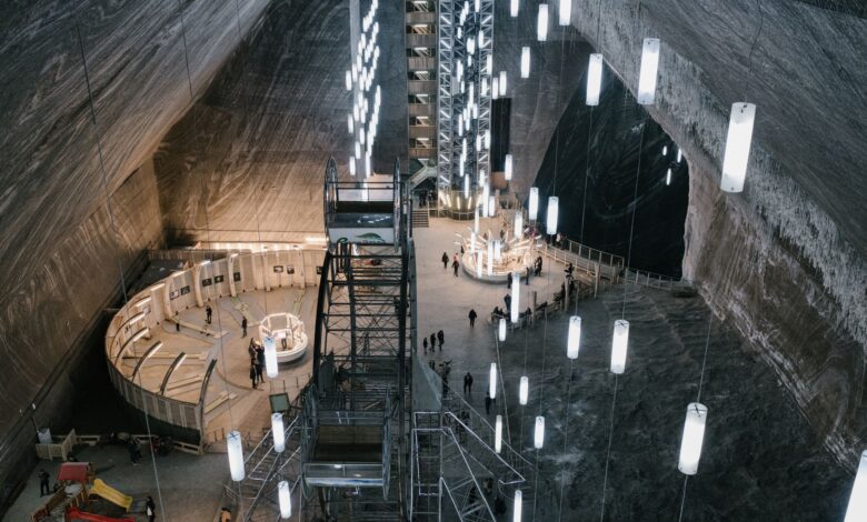 Interior of a large underground salt cavern showing geological formations