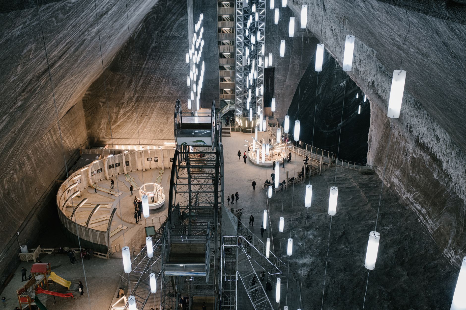 Interior of a large underground salt cavern showing geological formations