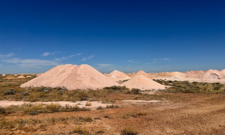 Aerial view of a large open-pit potash mining operation with extraction equipment