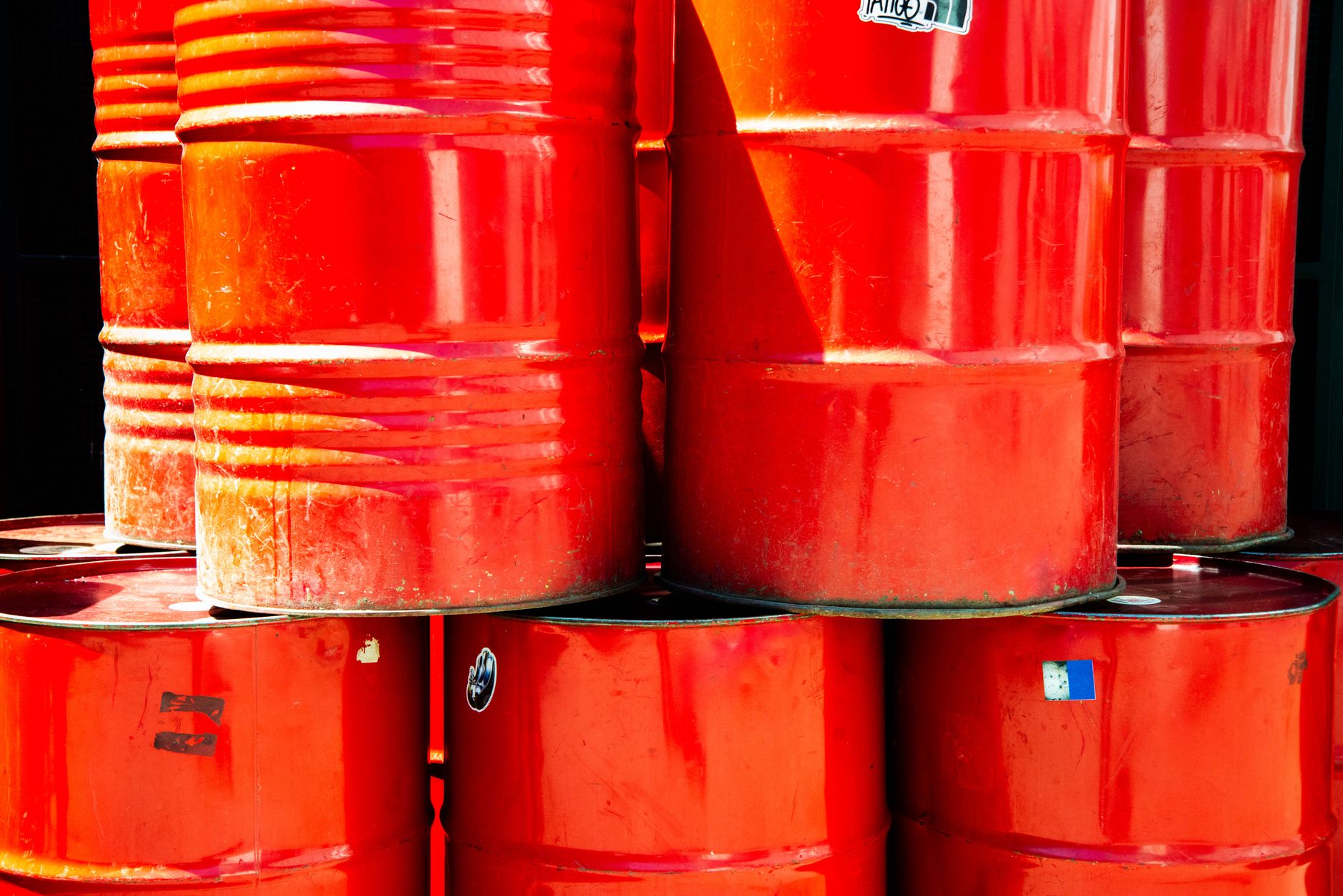 Large industrial chemical storage tanks at a port terminal facility