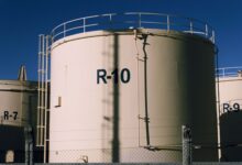 Large industrial storage tanks at a bulk liquid terminal facility