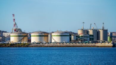 Large industrial storage terminal with tanks and pipelines for bulk liquid commodities