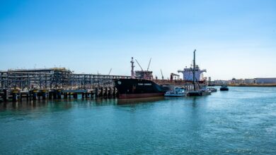 Large LNG regasification terminal at a coastal industrial port facility
