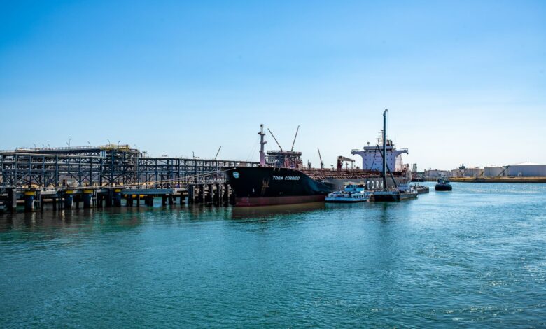 Large LNG regasification terminal at a coastal industrial port facility