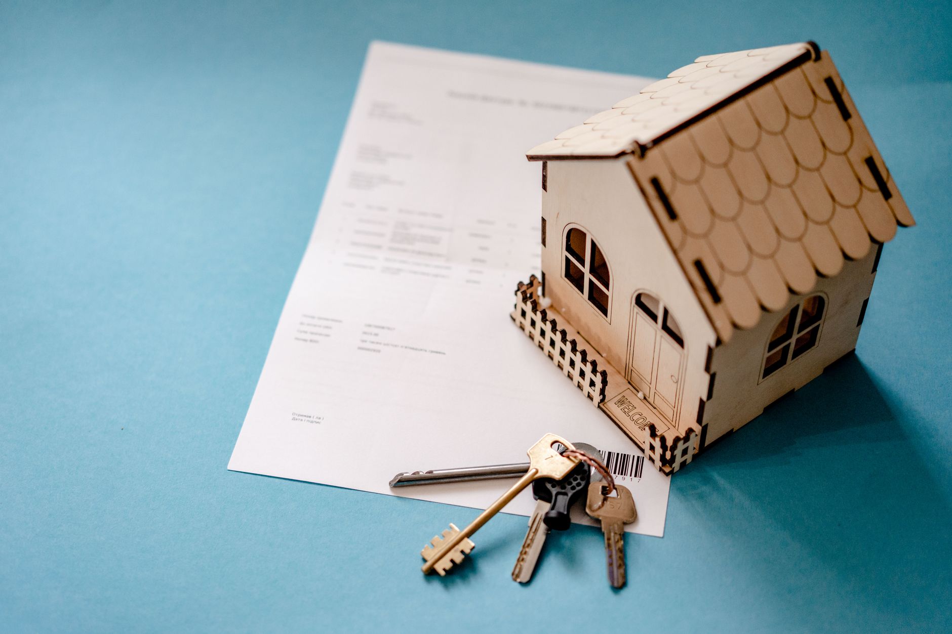 Legal property documents and deed paperwork on a desk