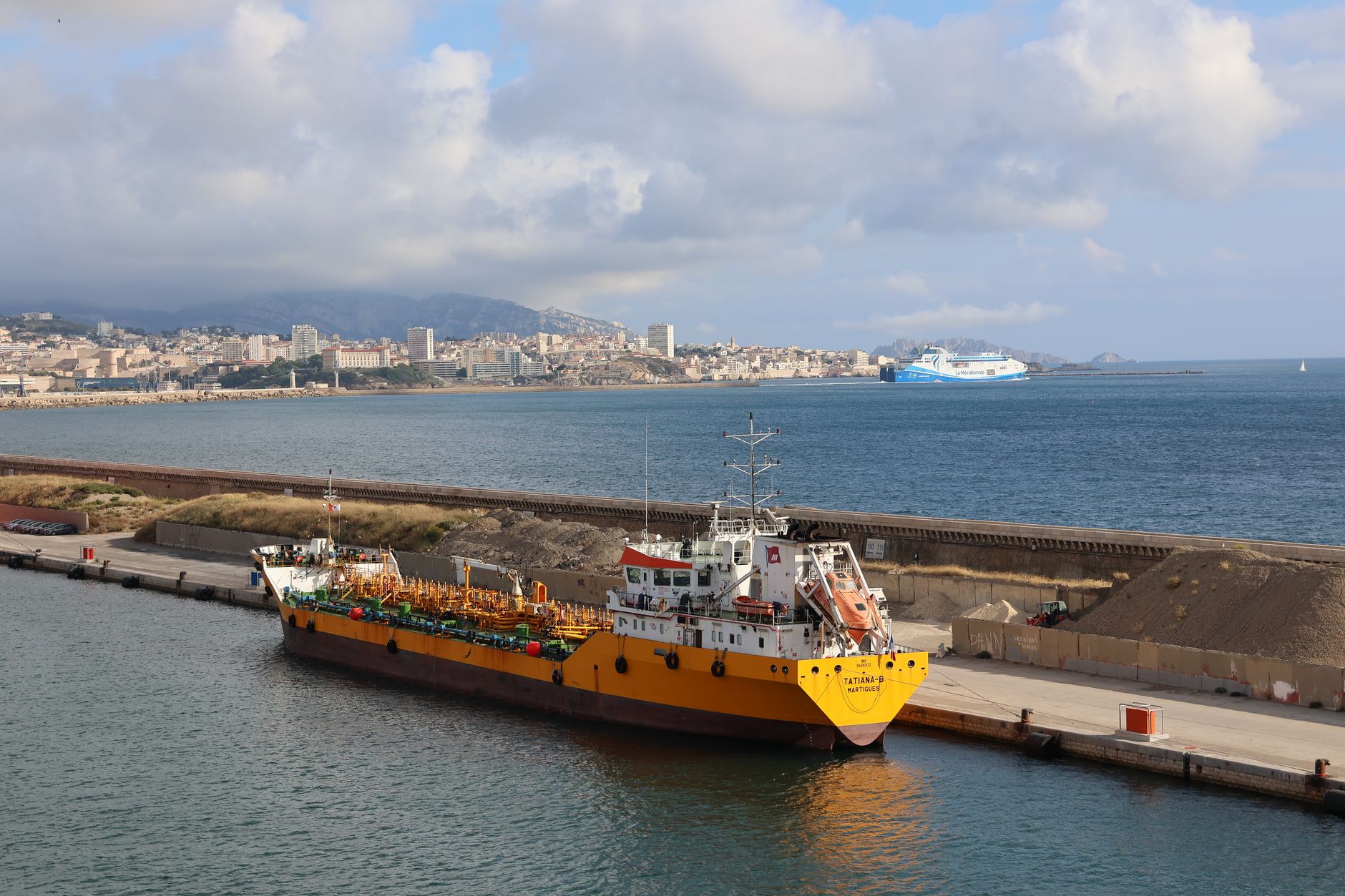 Industrial maritime dock infrastructure at a commercial shipping terminal
